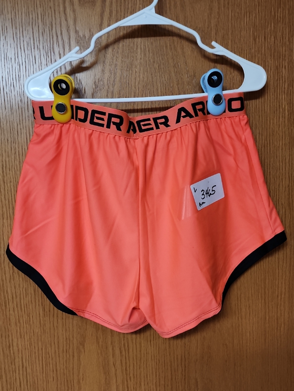 Under Armour Neon Coral Athletic Shorts womens L number 3465